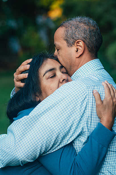 Couple comforting one another